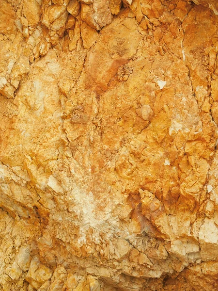 Gold rock texture closeup background. — Stock Photo, Image