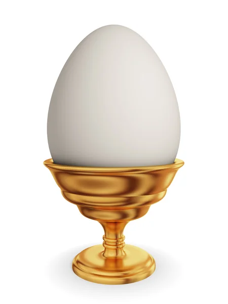 Ei in einer goldenen Schale. — Stockfoto