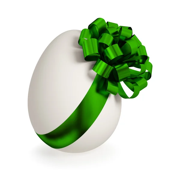 Bílá vejce zabalená s zelenou stuhu. — Stock fotografie