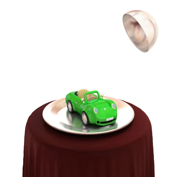 Grünes Auto auf silbernem Teller. — Stockfoto