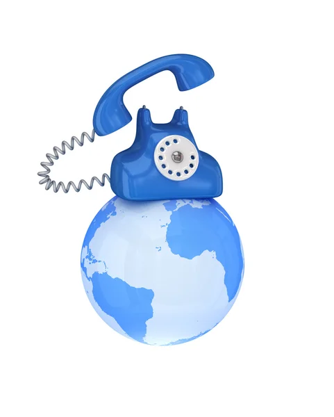 Téléphone bleu rétro sur un globe — Photo