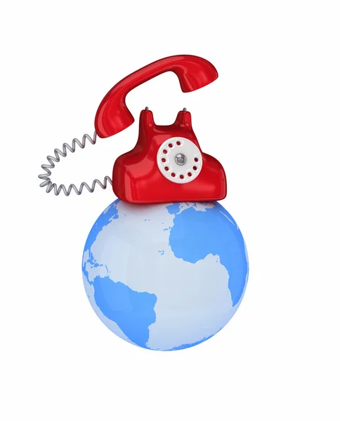Rode retro telefoon op een wereldbol — Stockfoto