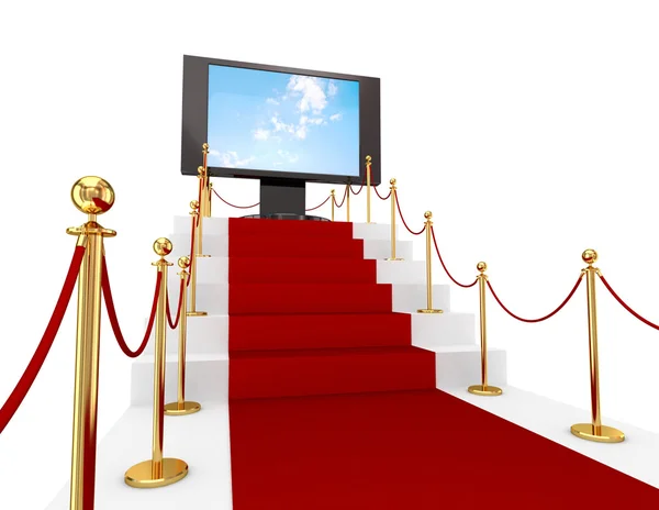 Red carpet on a stairs and LCD monitor. — Stock Photo, Image