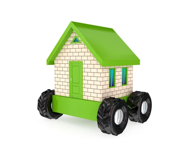 Small house on a big black wheels. — Stock Photo, Image