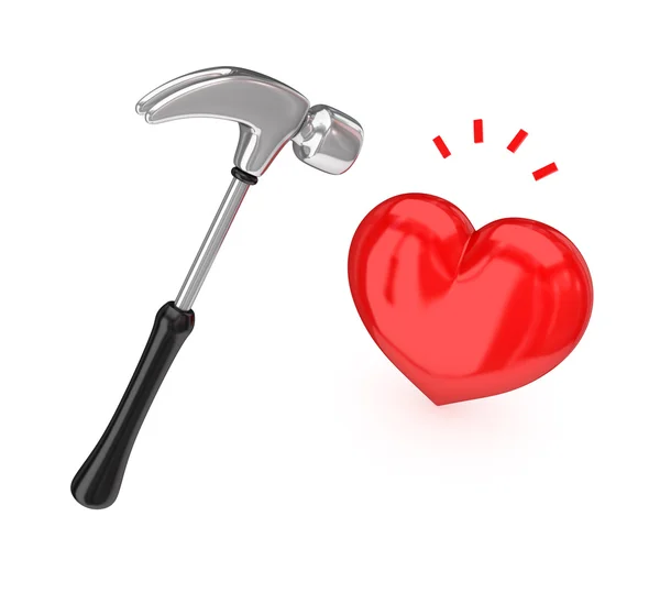 Grote verchroomde hamer raken een rood hart. — Stockfoto