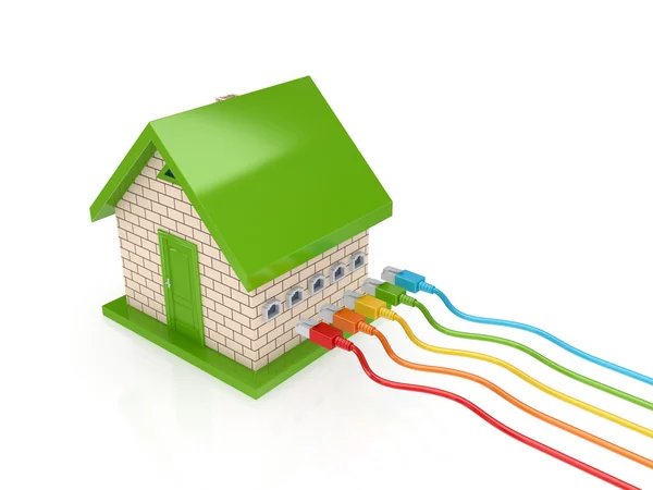 Barevné propojovacích kabelů a malý dům. — Stock fotografie