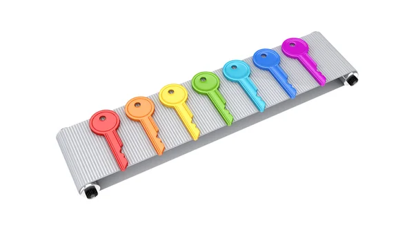 Colorful keys on grey conveyor. — Stock Photo, Image