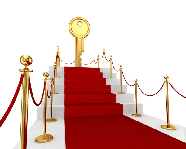 Roter Teppich auf einer Treppe und goldener Schlüssel oben. — Stockfoto