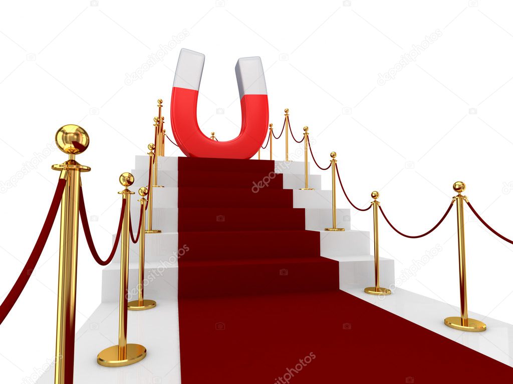 Red carpet on a stairs and large magnet above.