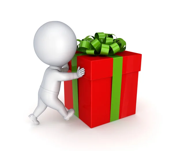3D kleine Person schiebt eine rote Geschenkbox. — Stockfoto