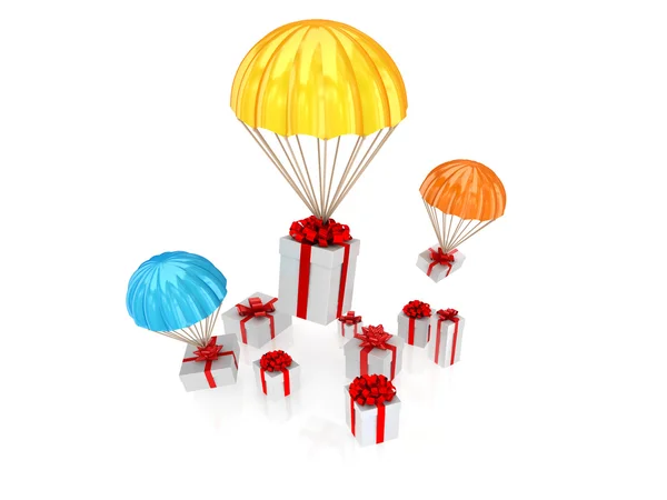 礼品盒与多彩的降落伞飞. — 图库照片