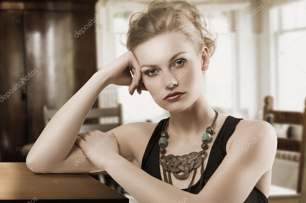 Blond woman with necklace