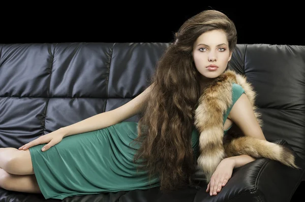 Young elegant girl in green with fur — Stock Photo, Image