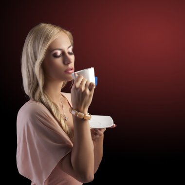 Blond sensual woman with white tea cup clipart