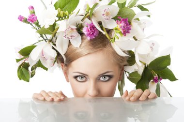 Pretty blond with flower crown on head, she is behind the table clipart