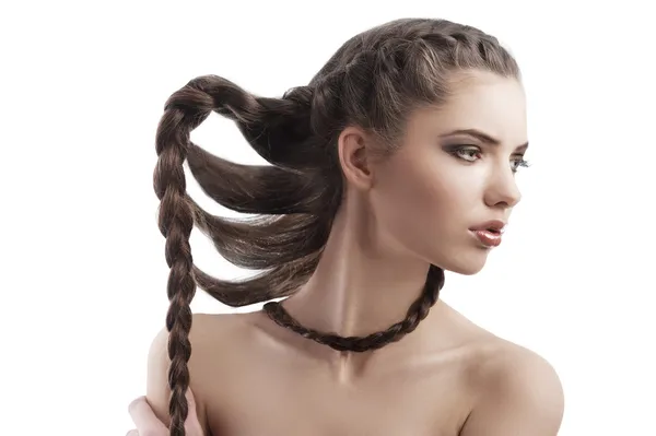 Pretty brunette with a long braid — Stock Photo, Image