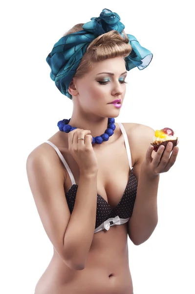 Blond girl and ruined pastry — Stock Photo, Image