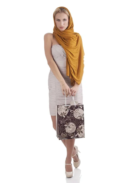 Elegante mode meisje houden boodschappentas — Stockfoto