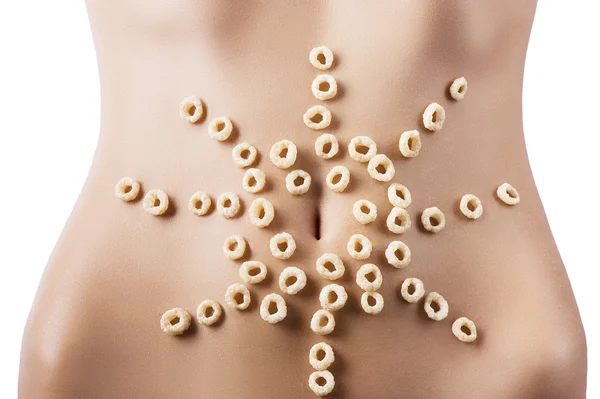Composition of cereals over belly — Stock Photo, Image