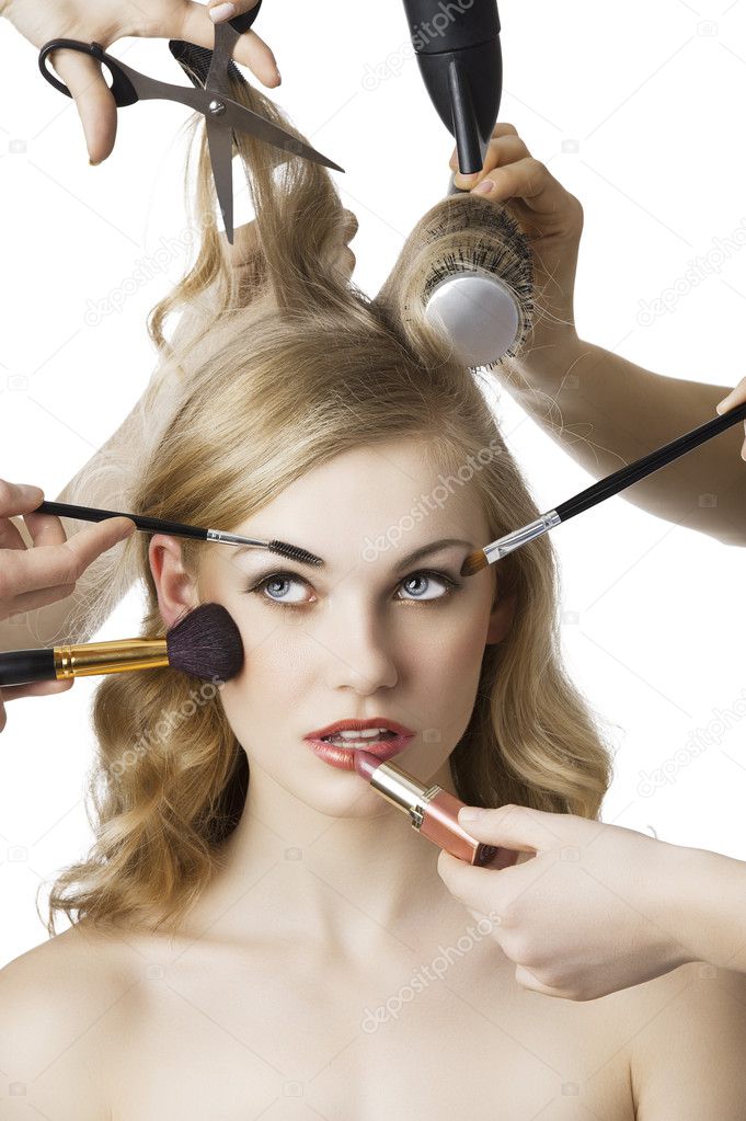 In beauty salon, the girl looks up at right