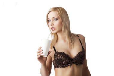Drinking girl in lingerie with sexy expression clipart