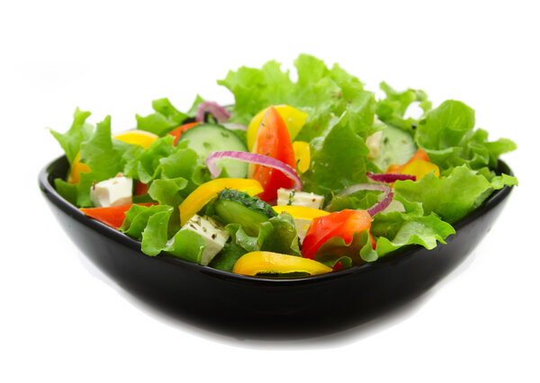 Vegetable salad in black square plate