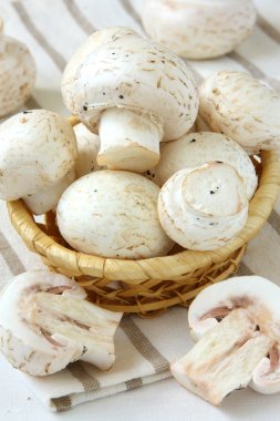 Mushrooms in the basket clipart