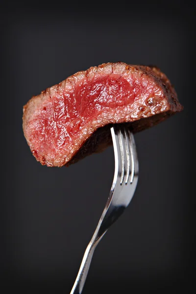 Biefstuk mondvol Stockfoto