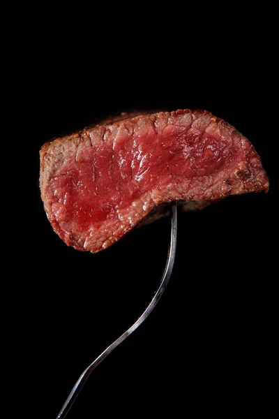 Steak mouthful Royalty Free Stock Images