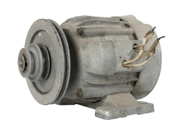 stock image Old electric motor with a pulley (isolated)