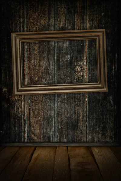 Oud houten frame aan de muur. — Stockfoto