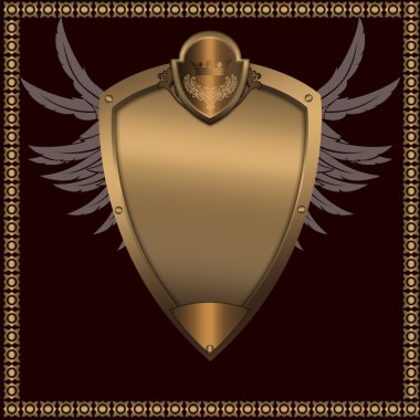 Gold shield with wings. clipart