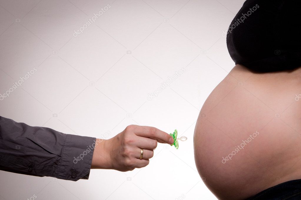 Pregnant woman belly with dummy