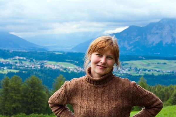 Alps summer village and woman portrait — Stock Photo, Image