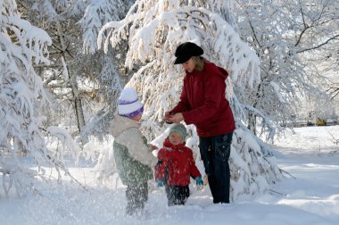 Family in winter park clipart