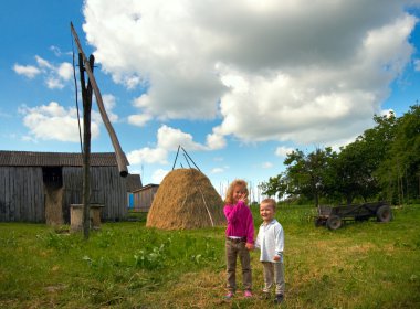 Children on country homestead clipart