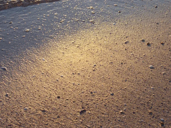 Sabbia umida e tramonto — Foto Stock