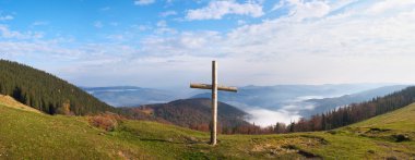 Cross on mountain clipart