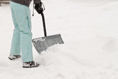 Snow pants shoveling clipart