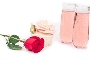Rose shaped cupcake with champagne clipart