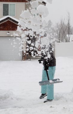 Snow pants shoveling clipart