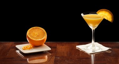 Orange martini with an orange slice clipart