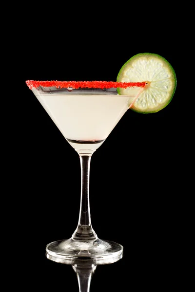 Back lit key lime martini with red sugar — Stock Photo, Image