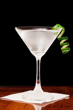 Martini with a lime twist clipart