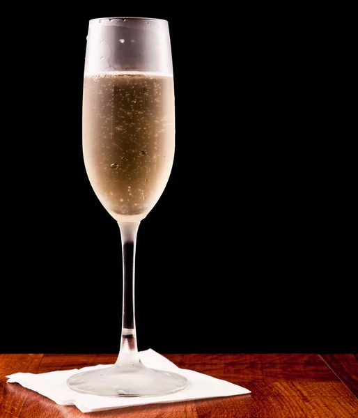 Champagne fluit geïsoleerd op zwart — Stockfoto
