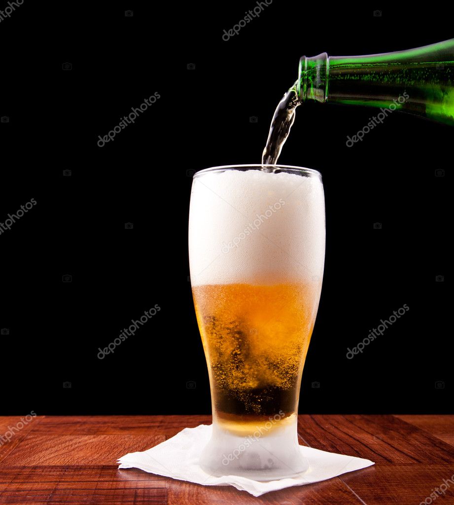 Pouring a beer — Stock Photo © wollertz 9893348