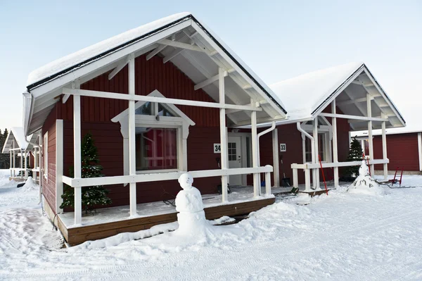 Wooden house in Lapland in winter landscape — Stock Photo, Image