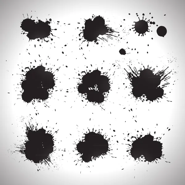Jeu d'éclaboussures de peinture Grunge — Image vectorielle