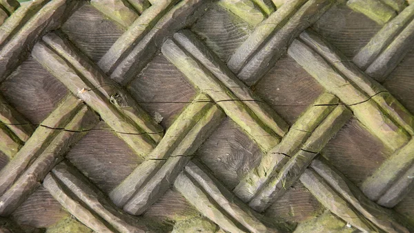 Fundo de madeira velha esculpida em padrão celta — Fotografia de Stock