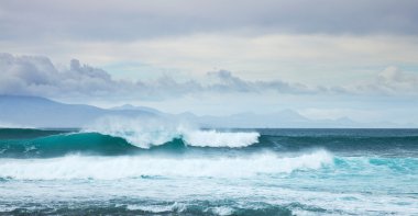 Sea swell by the northern shore of Fuerteventura clipart